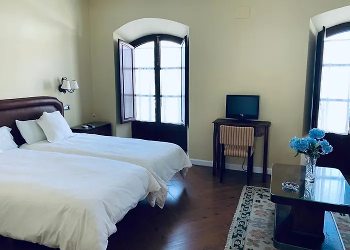 Отель Balcones De